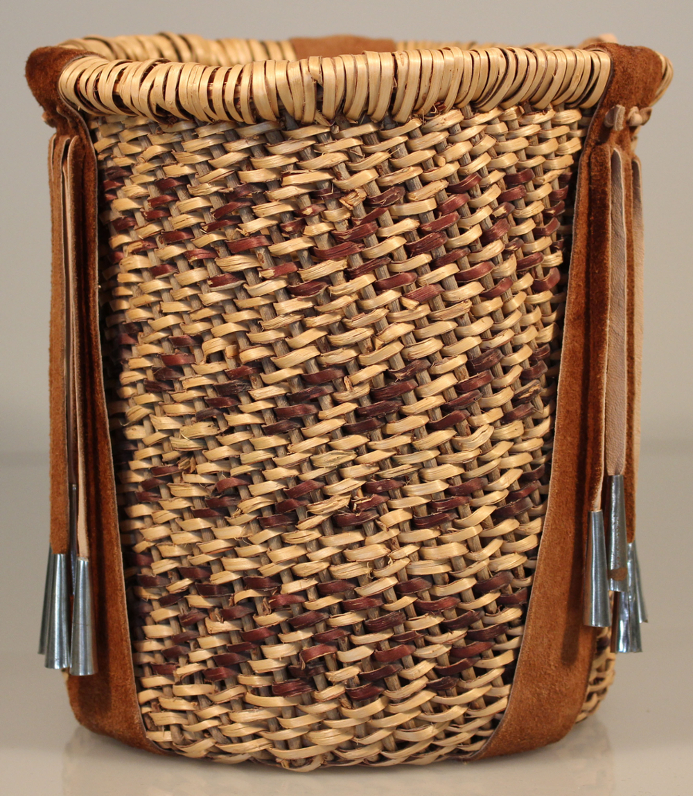 2020.01.01, twined cylindrical basket by Lydia Pesata with diagonal designs.